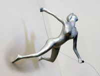 Ancizar Marin Sculptures  Ancizar Marin Sculptures  Female Climber Stretching Away from Wall (Silver Figure)